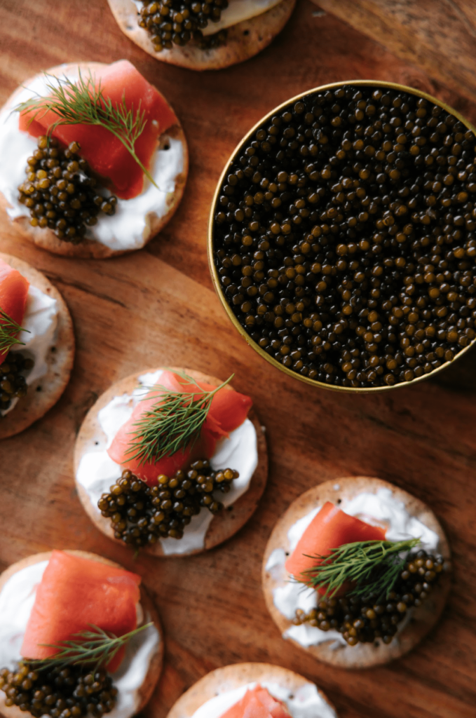 crackers with caviar showcase on table