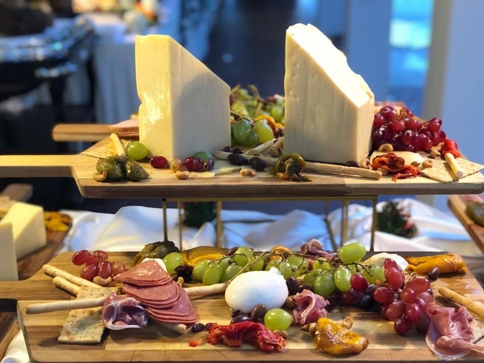 Sea Scent at Keppel Club's lavish charcuterie and cheese spread on a two-tiered wooden stand