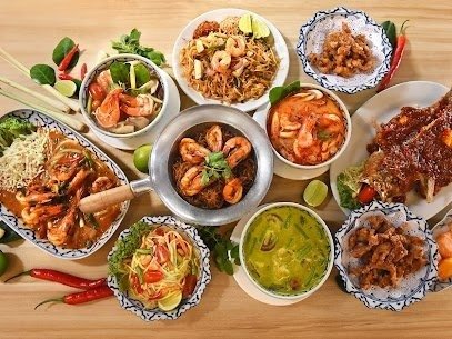 Overhead shot of a vibrant Thai food feast from 87 Just Thai