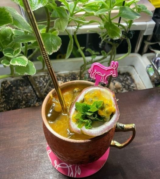A vibrant Passionfruit Moscow Mule cocktail from Chimichanga Little India