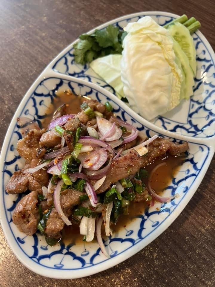 A dish of Thai meat salad, likely pork Nam Tok, from Esarn Thai Corner Pasir Panjang