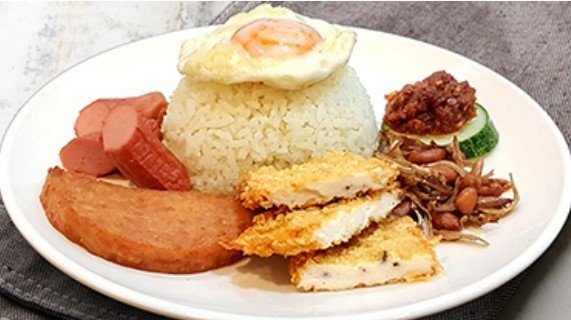 "A white plate of Nasi Lemak from Qi Ji restaurant