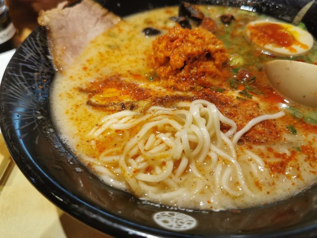 Close-up of a rich and spicy bowl of ramen from Ramen Keisuke restaurant