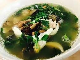 a picture of a spinach soup in a bowl