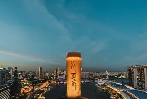 marina bay financial center level 33 with a majito drink