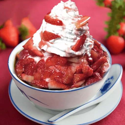 A bowl of strawberry shaved ice from Within the walls dessert bar