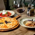 Italian charcuterie platter with burrata salad