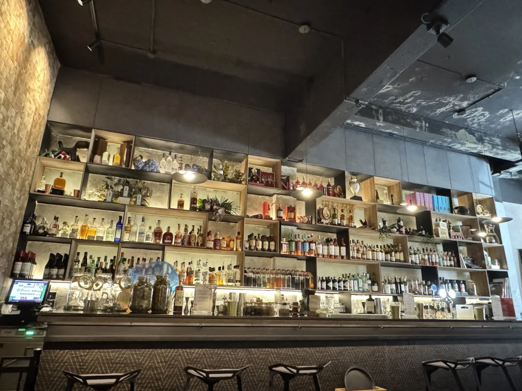 Interior view of the modern bar counter at Tess Bar & Kitchen in Singapore